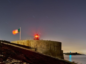 A beacon of hope in night sky: Dun Laoghaire Lighthouse.