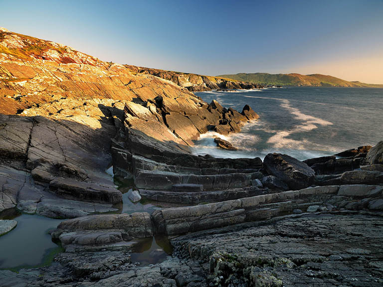 Atlantic waves breaking against rugged rock formations at Allihies Point in County Cork
