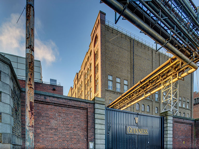 Fine art architectural photograph of the Guinness Storehouse seen from Grand Canal Place in Dublin