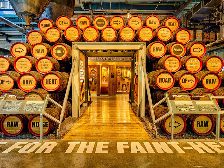 Interior photograph of the Cooperage inside the Guinness Storehouse in Dublin with barrels timber staves and soft light.