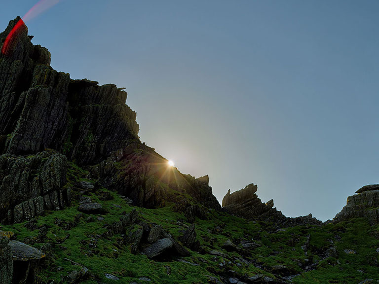 Evening light on the cliffs of Skellig Michael above the Atlantic Ocean