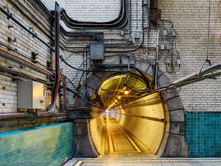 Industrial interior photograph of a connection tunnel inside the Guinness Storehouse in Dublin