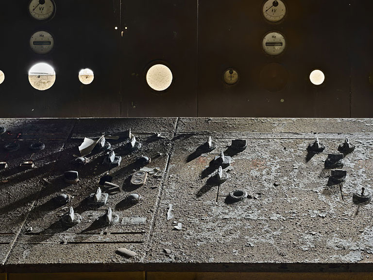 Sunlight falling across the old Pigeon House control room panels in Dublin