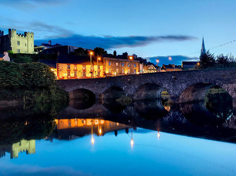 Fine art photograph of Enniscorthy Bridge at sunset reflecting in the River Slaney in County Wexford