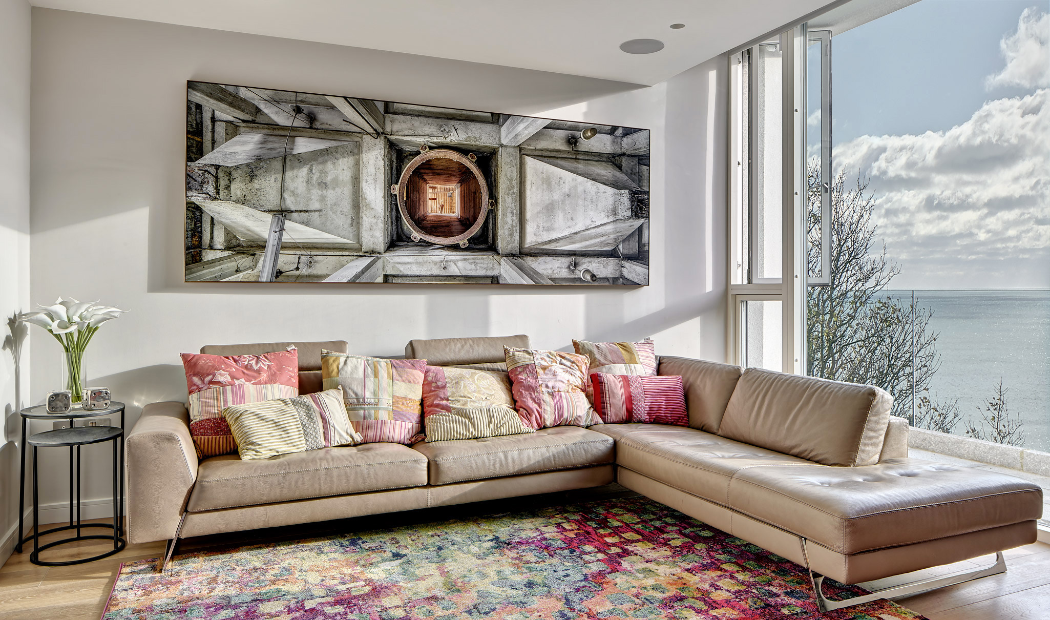 Large fine art photographic print displayed above a sofa